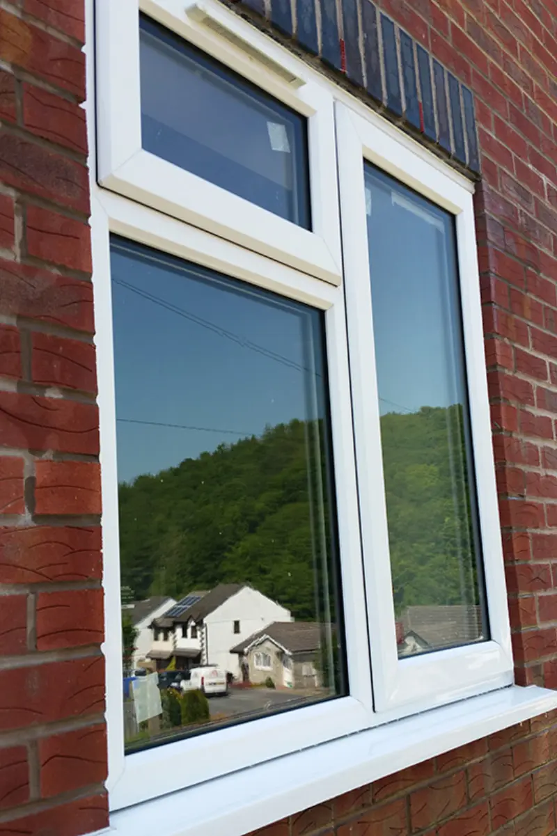 Window after cleaning — crystal-clear glass reflecting the view